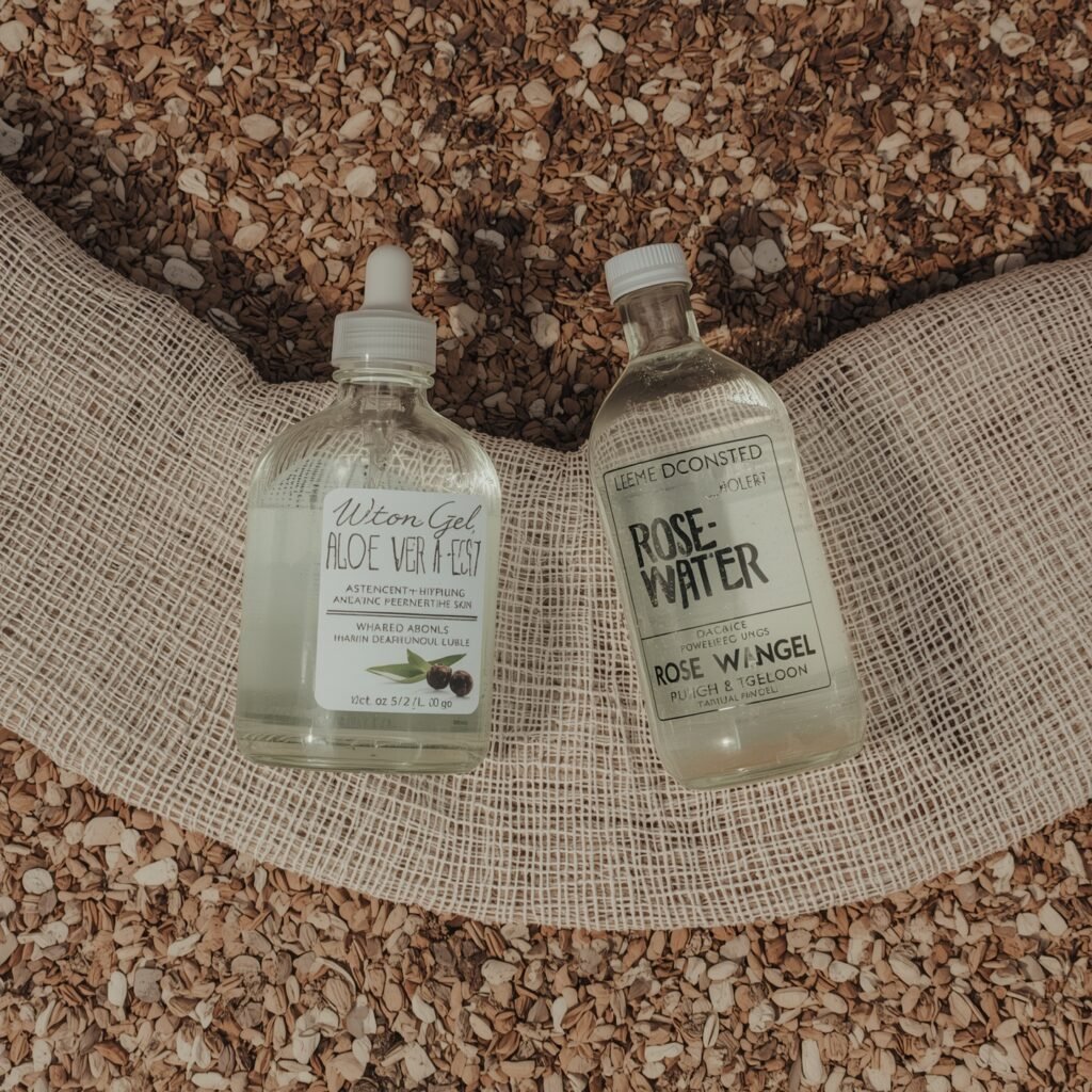 "Rose water and Aloe Vera gel bottles, perfect for DIY grooming recipes for men. These hydrosols and herbal infusions are soothing and hydrating, ideal for men’s skincare."
